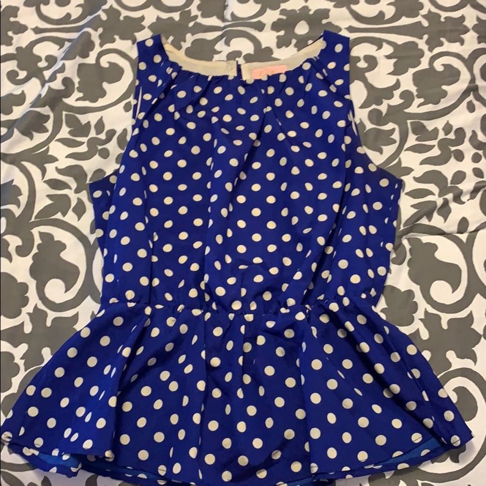 Blue and white polka dot peplum top